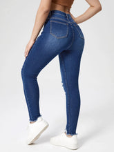 High Waist Button Front Ripped Raw Hem Skinny Jeans